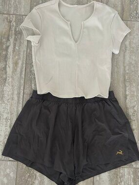 Tracksmith shorts and cute ALO top